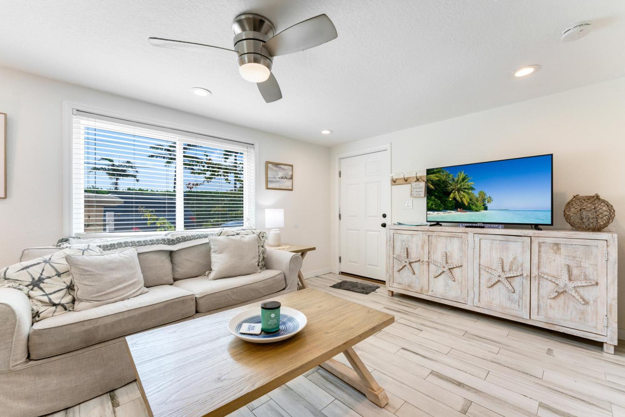 Tides Inn On The Bay Vacation Homes 布雷登顿海滩 外观 照片