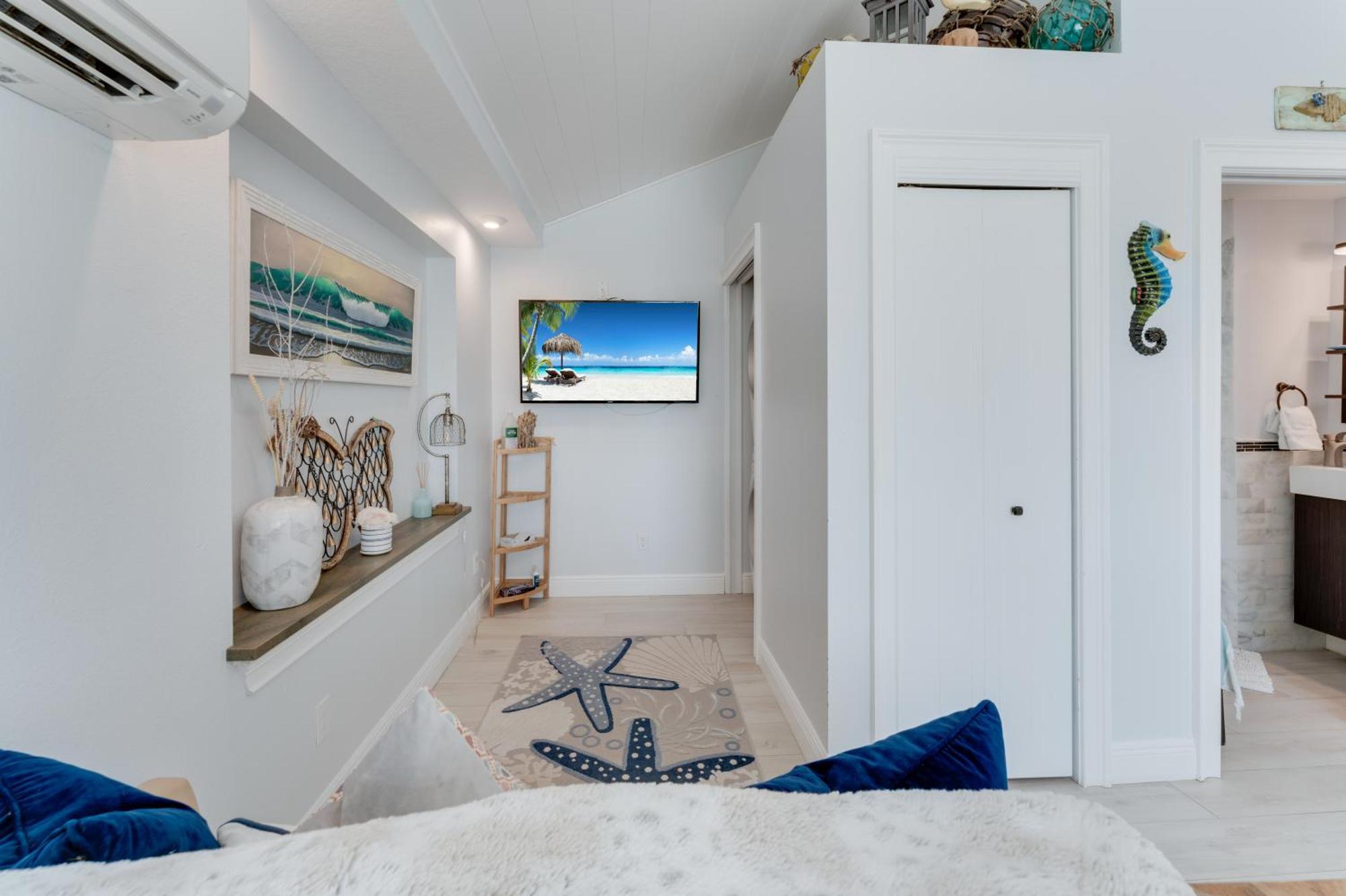 Tides Inn On The Bay Vacation Homes 布雷登顿海滩 外观 照片