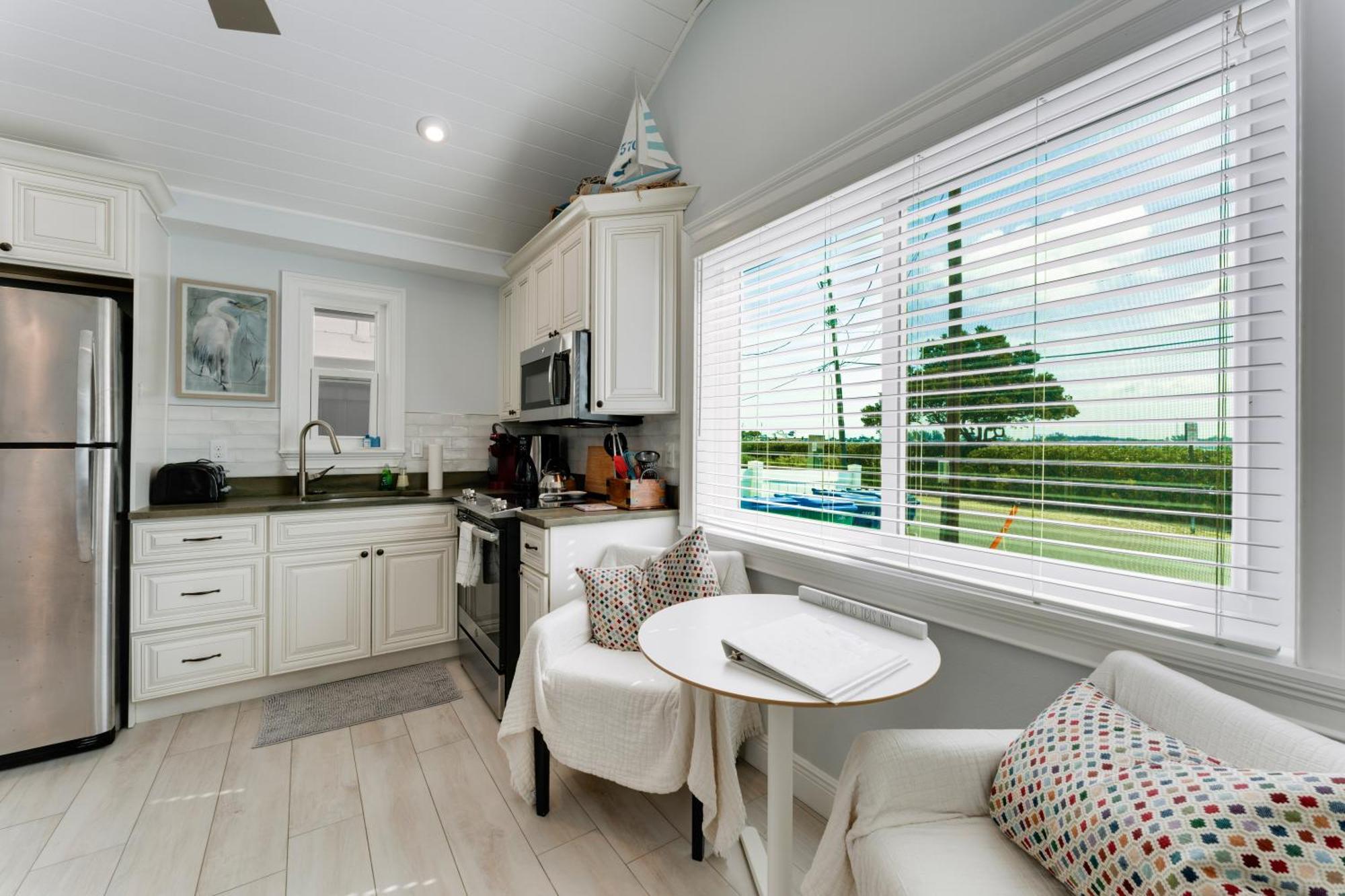 Tides Inn On The Bay Vacation Homes 布雷登顿海滩 外观 照片