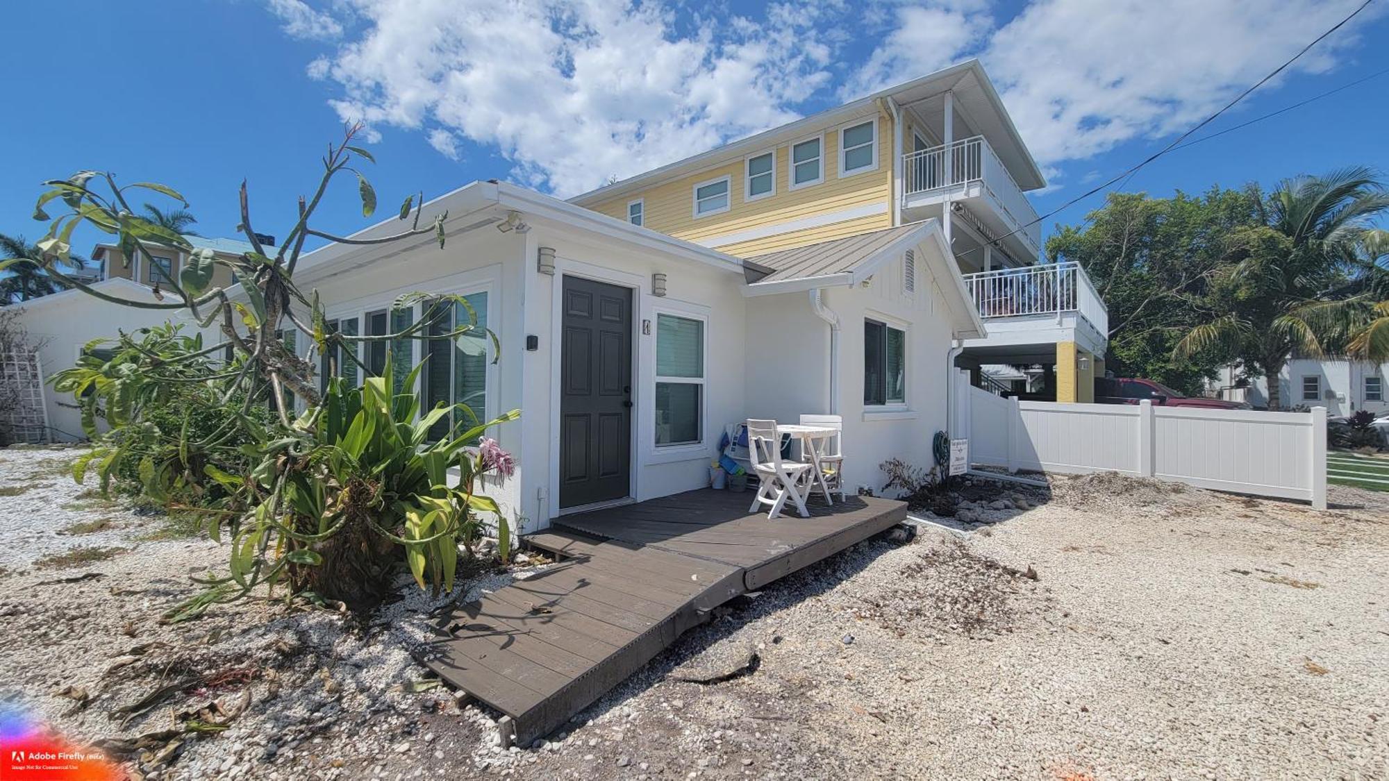 Tides Inn On The Bay Vacation Homes 布雷登顿海滩 外观 照片