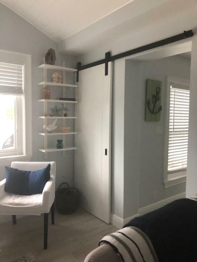 Tides Inn On The Bay Vacation Homes 布雷登顿海滩 外观 照片