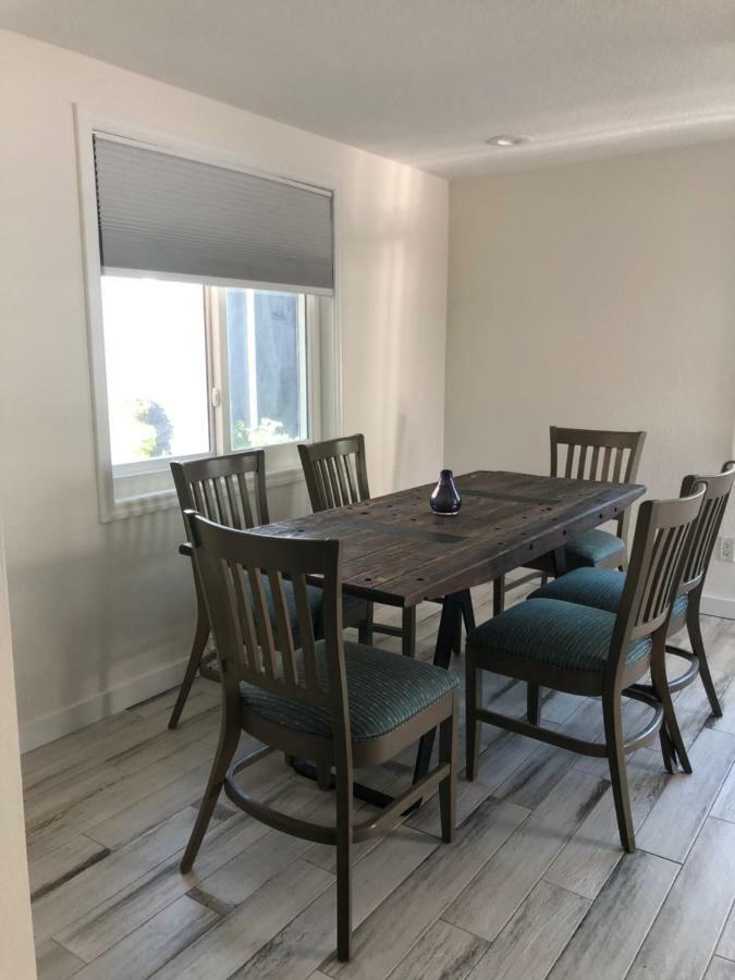 Tides Inn On The Bay Vacation Homes 布雷登顿海滩 外观 照片