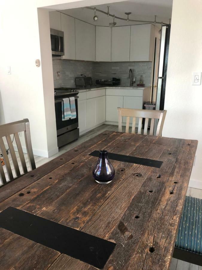 Tides Inn On The Bay Vacation Homes 布雷登顿海滩 外观 照片